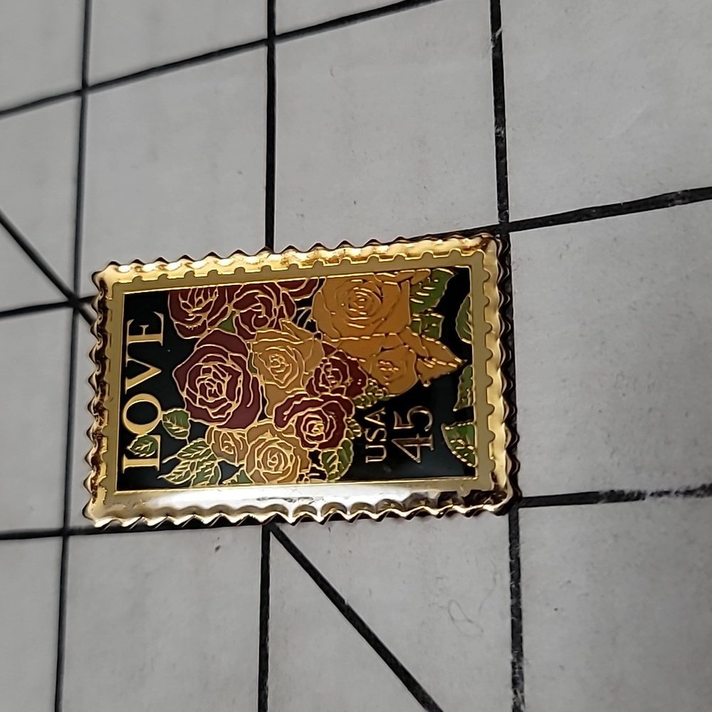 Love postage stamp‎ pin